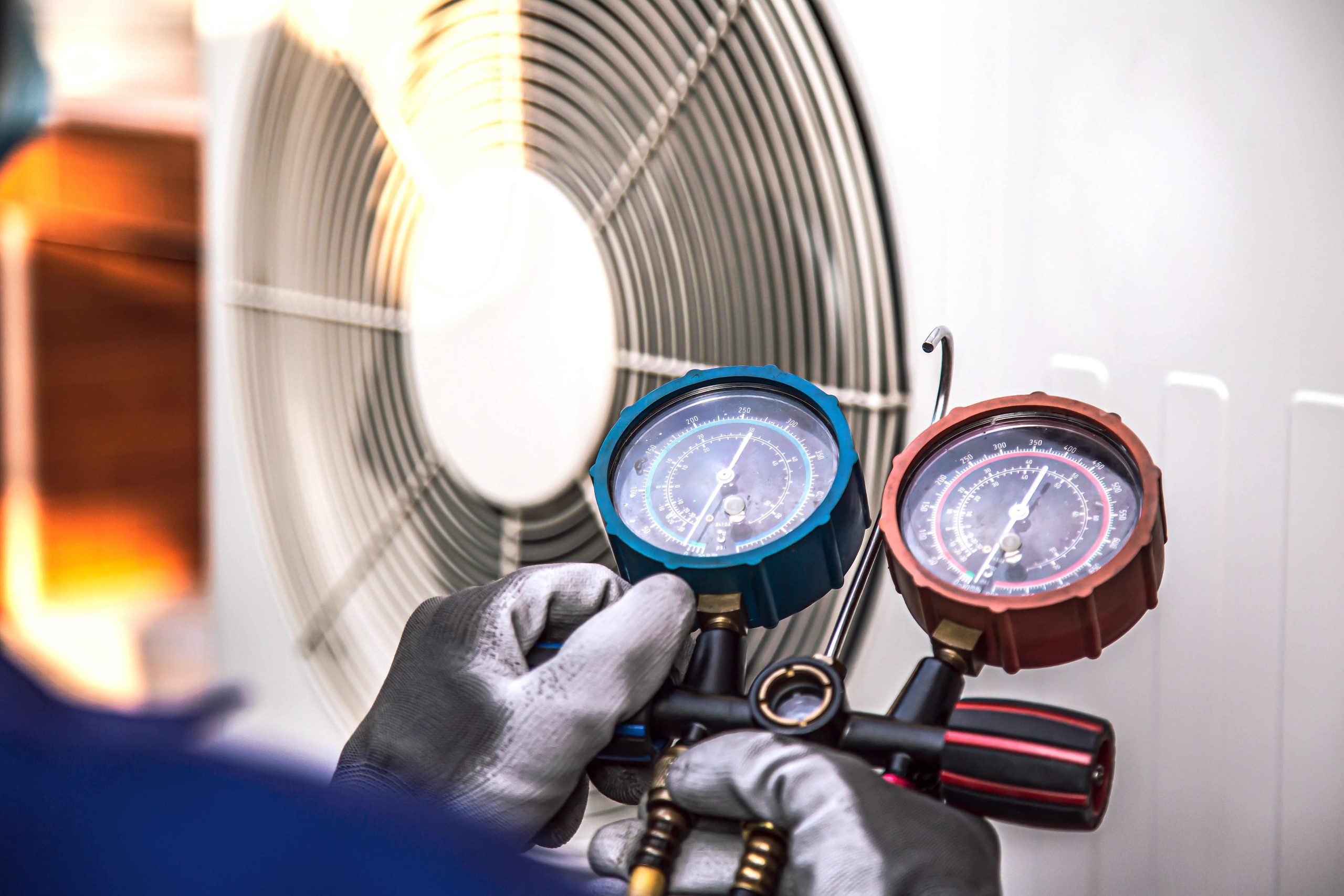 Technician performing HVAC services in Manassas, VA.