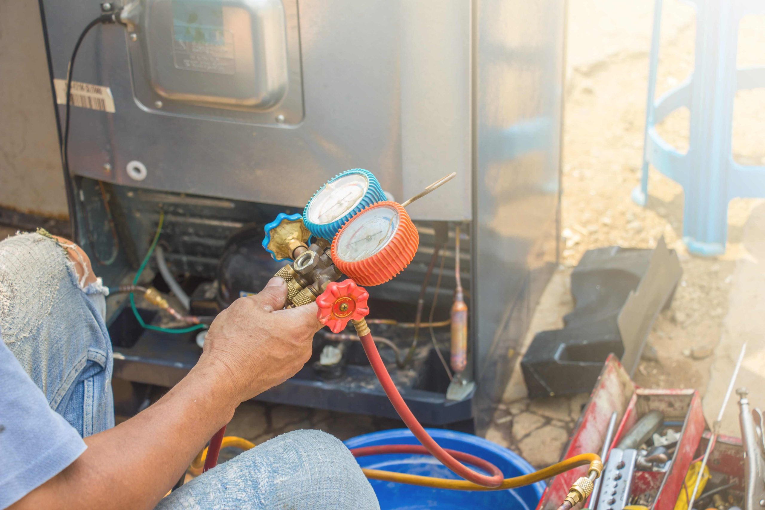 Hvac technician working on an AC repair in Arlington, VA.