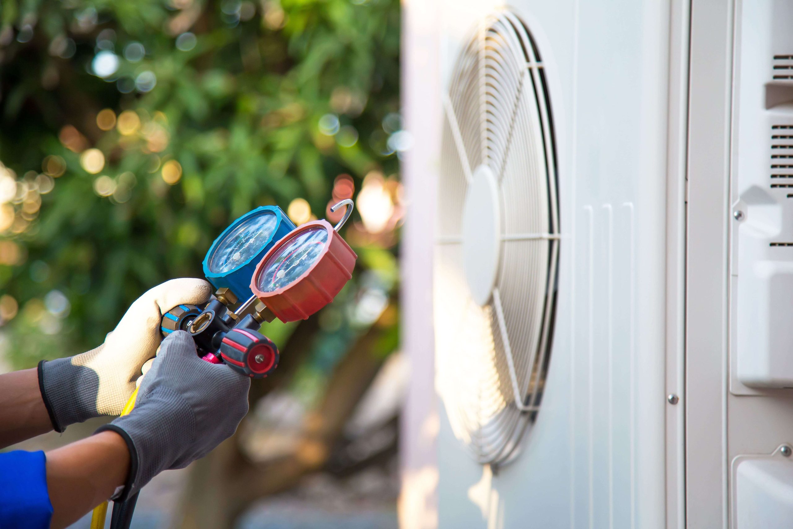 Hvac service technician working on an HVAC system in Chantilly, VA.